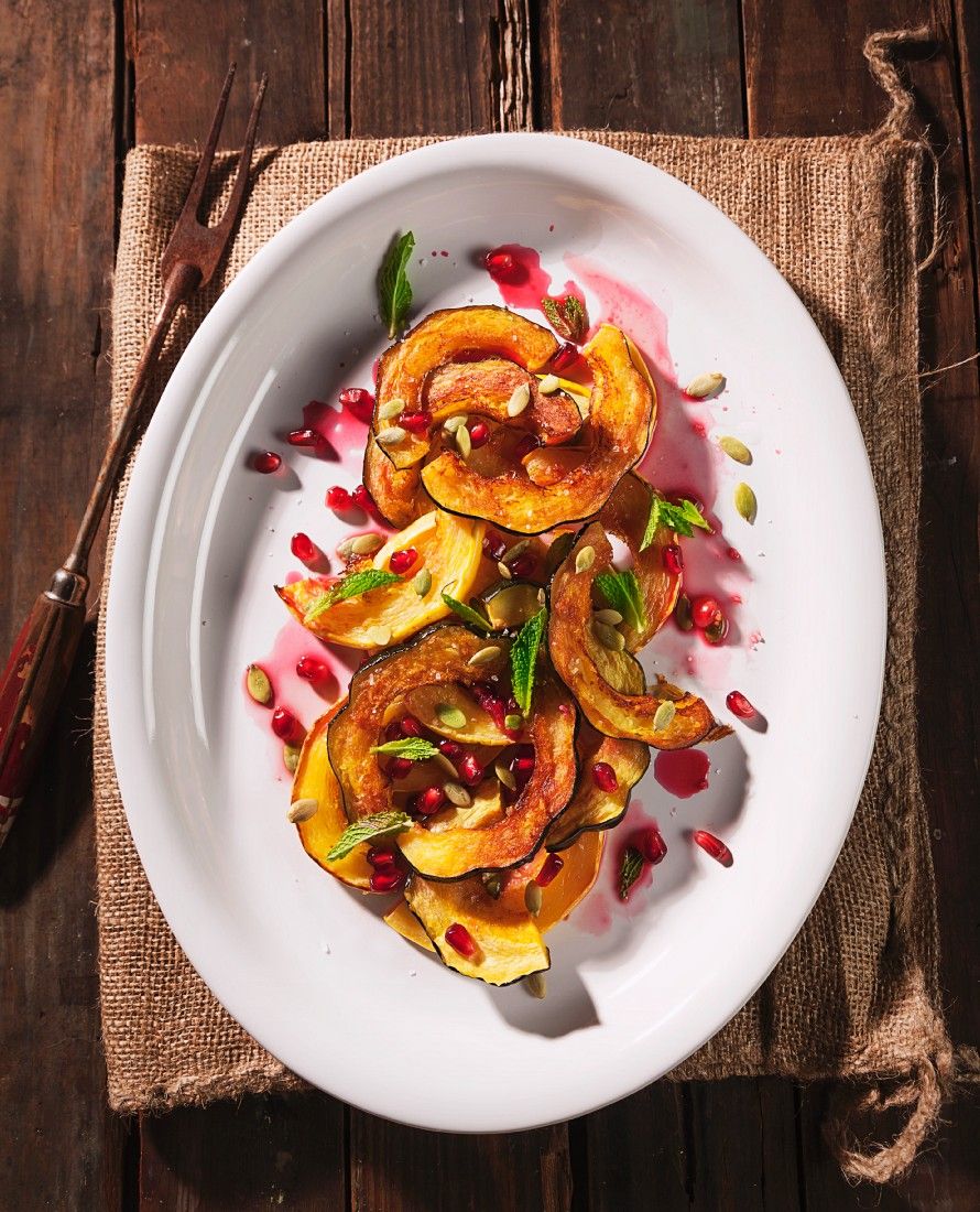 Kürbis mit Granatapfel